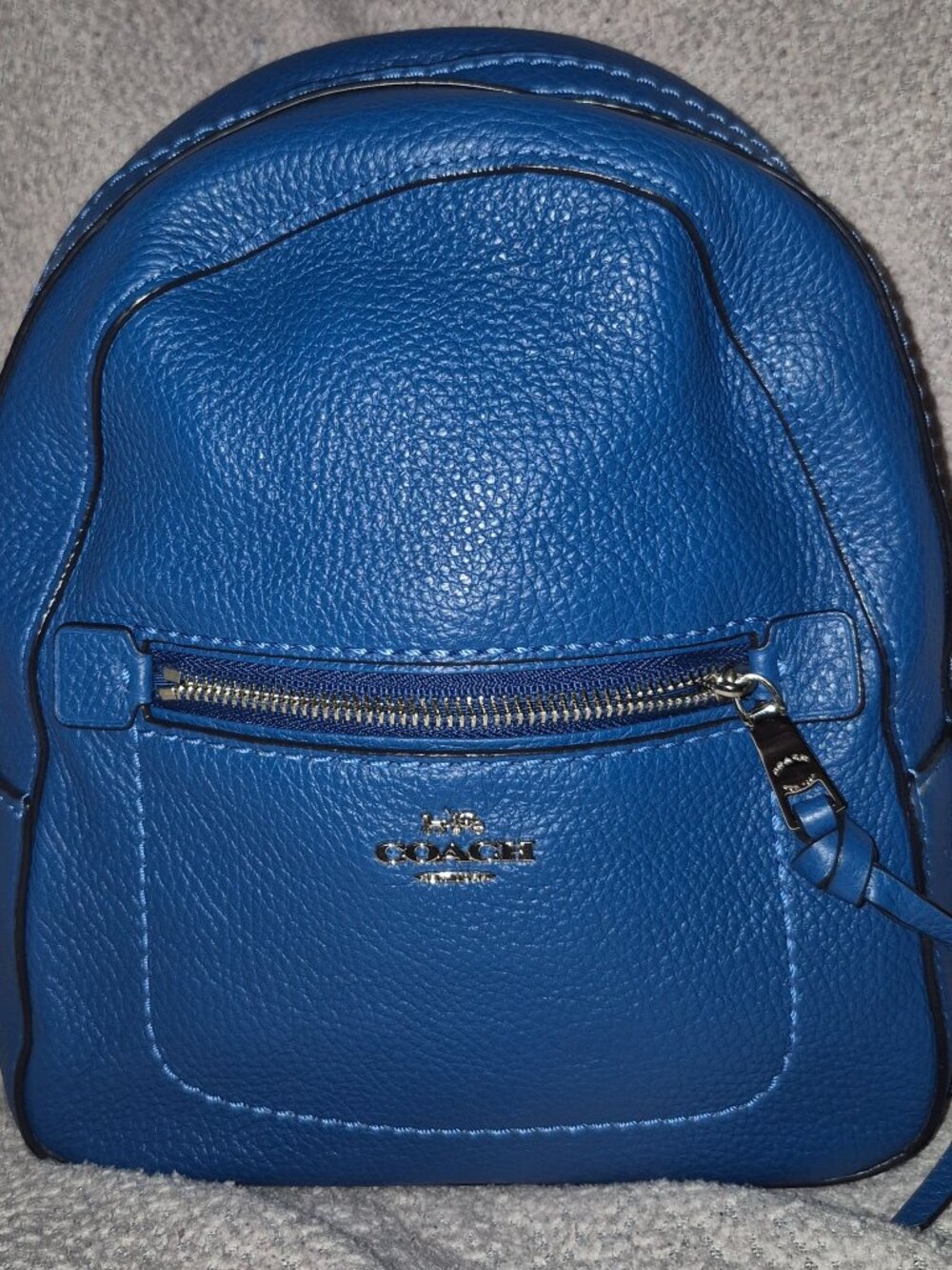 Blue leather backpack